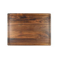11" x 17" solid walnut cutting board with arched sides and juice groove (Reversible)